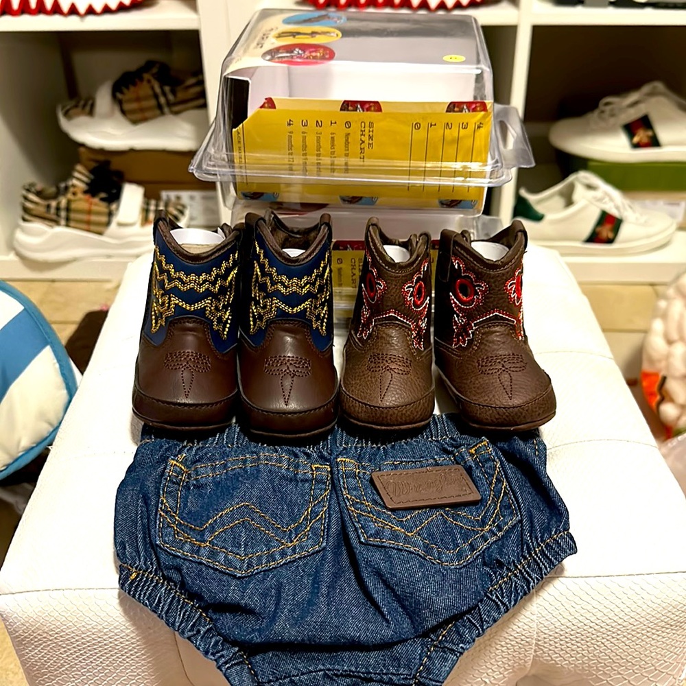 2 set of ariat cowboy boots and a wangler diaper cover